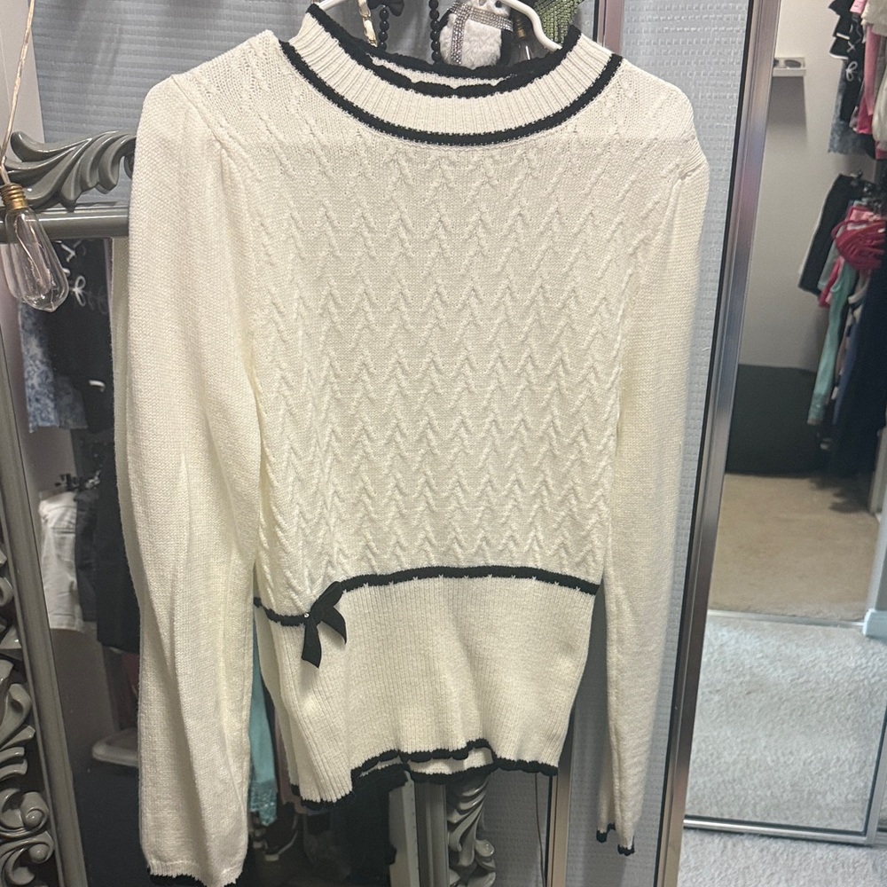 White Sweater with Black Trim